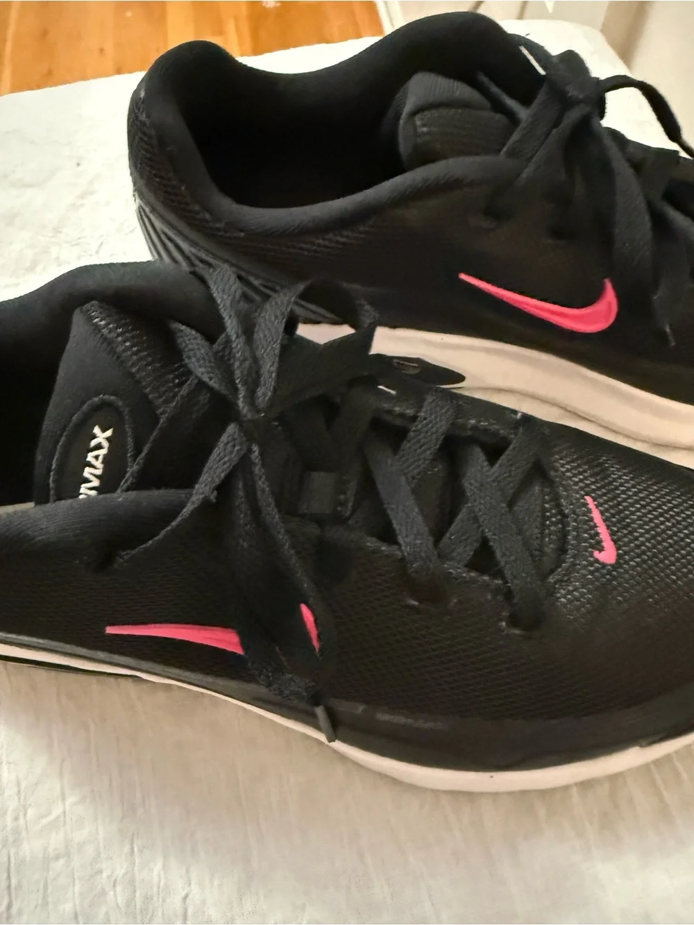 Nike Women's Black Athletic Shoes with Pink Swoosh